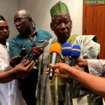 Ganduje speaking with newsmen