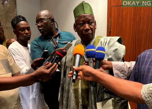 Ganduje speaking with newsmen