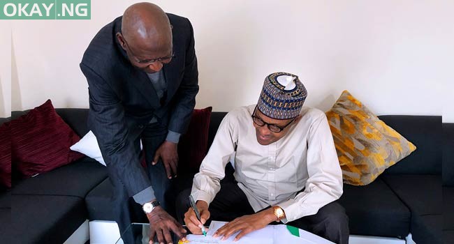 President Muhammadu Buhari signing the amended Deep Offshore Act