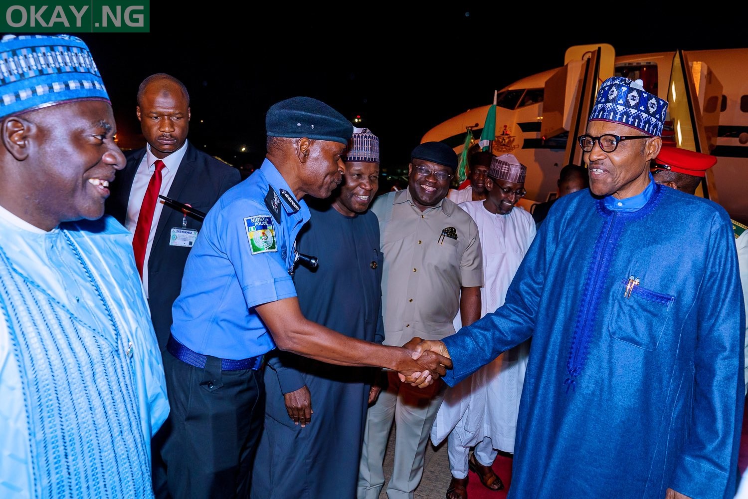 Buhari returns to Abuja after London trip [Photos from Bayo Omoboriowo]