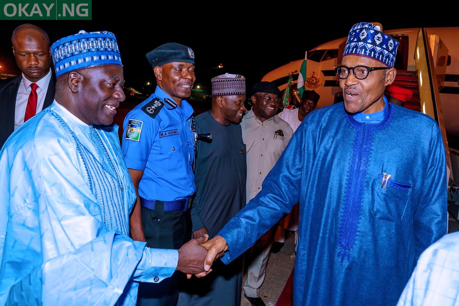 Buhari returns to Abuja after London trip [Photos from Bayo Omoboriowo]