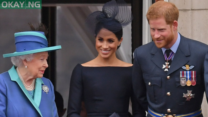 Queen Elizabeth II with Prince Harry and Meghan Markle