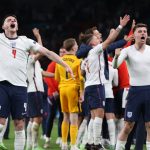 England’s players celebrate their win in the UEFA EURO 2020 semi-final football match between England and Denmark at Wembley Stadium in London on July 7, 2021.