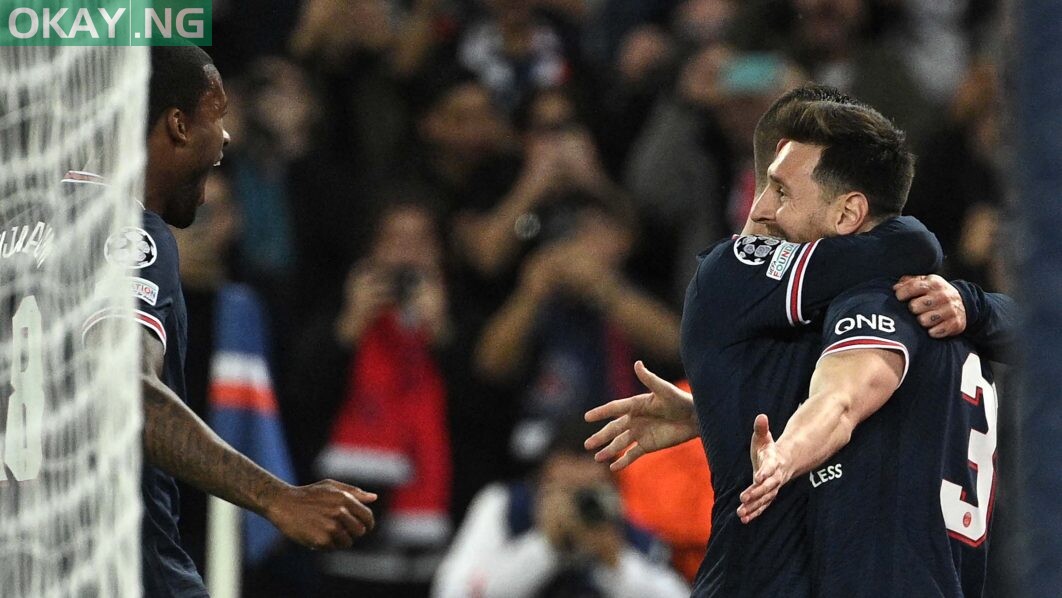 Real Madrid’s French forward Karim Benzema celebrates after Shakhtar Donetsk’s Ukrainian defender Serhiy Kryvtsov scored an own goal during the UEFA Champions League football match between Shakhtar Donetsk and Real Madrid at the Olympic Stadium in Kiev on October 19, 2021. (Photo by Sergei SUPINSKY / AFP)