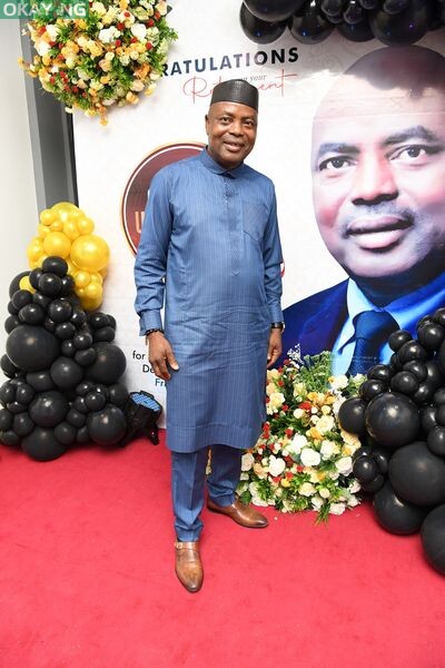 The retiring staff, Osmond Omulu