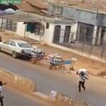 Scene of the robbery: One robber carrying a sac filled with money