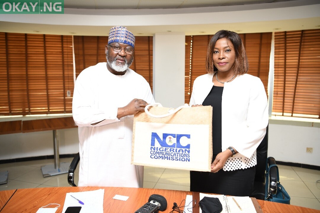 Engr. Ubale Maska, Executive Commissioner Technical Service (ECTS), presenting NCC's corporate gift to Juliet Ehimuan, West Africa Country Director, Google Nigeria