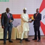 L-R: 3. Hon. Chike Okafor, representing the House Committee Chairman on Finance; Chairman FIRS, Muhammad Nami, and Prince Clement Agba Minister of State Budget and National Planning presenting the Awards to Modupe Kadri, Chief Financial Officer, MTN Nigeria at National Tax Dialogue Event held at the Banquet Hall, State House Presidential Villa Abuja on Tuesday, March 29, 2022.