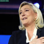 French far-right party Rassemblement National (RN) presidential candidate Marine Le Pen reacts at the Pavillon d’Armenonville in Paris on April 24, 2022 after the announcement of the first projections by polling firms of the French presidential election’s second round results. Thomas SAMSON / AFP