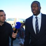 Manchester City and France footballer Benjamin Mendy (R) arrives to Chester Crown Court in northwest England on August 10, 2022 at the start of his trial for the alleged rape and assault of seven women. Mendy, 28, who faces eight counts of rape, one count of sexual assault and one count of attempted rape, relating to seven young women, could see his playing career end in jail if convicted. (Photo by Lindsey Parnaby / AFP)