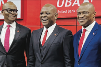 L-R: Former Group Managing Director/Chief Executive Officer, United Bank for Africa, Mr Kennedy Uzoka; Group Chairman, Mr Tony Elumelu; and the new Group Managing Director/CEO, Mr Oliver Alawuba, during the announcement of the new GMD and Executive Directors for UBA Group in Lagos…on Monday. Photo: UBA