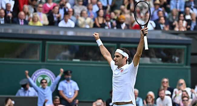 In this file photo, Switzerland’s Roger Federer celebrates his victory over Britain’s Cameron Norrie during their men’s singles third-round match on the sixth day of the 2021 Wimbledon Championships at The All England Tennis Club in Wimbledon, southwest London, on July 3, 2021. Ben STANSALL / AFP