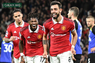 Manchester United’s Portuguese midfielder Bruno Fernandes (C) celebrates after scoring his team second goal during the English Premier League football match between Manchester United and Tottenham Hotspur at Old Trafford in Manchester, north west England, on October 19, 2022. (Photo by Oli SCARFF / AFP)