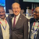 IMO Secretary-General Mr Kitack Lim (middle) embraces the NIMASA DG, Dr. Bashir Jamoh, OFR, as Nigeria's Alternate Permanent Representative (APR) to the IMO, Abdul Dirisu looks on during World Maritime Day Parallel Event held in Durban, South Africa.