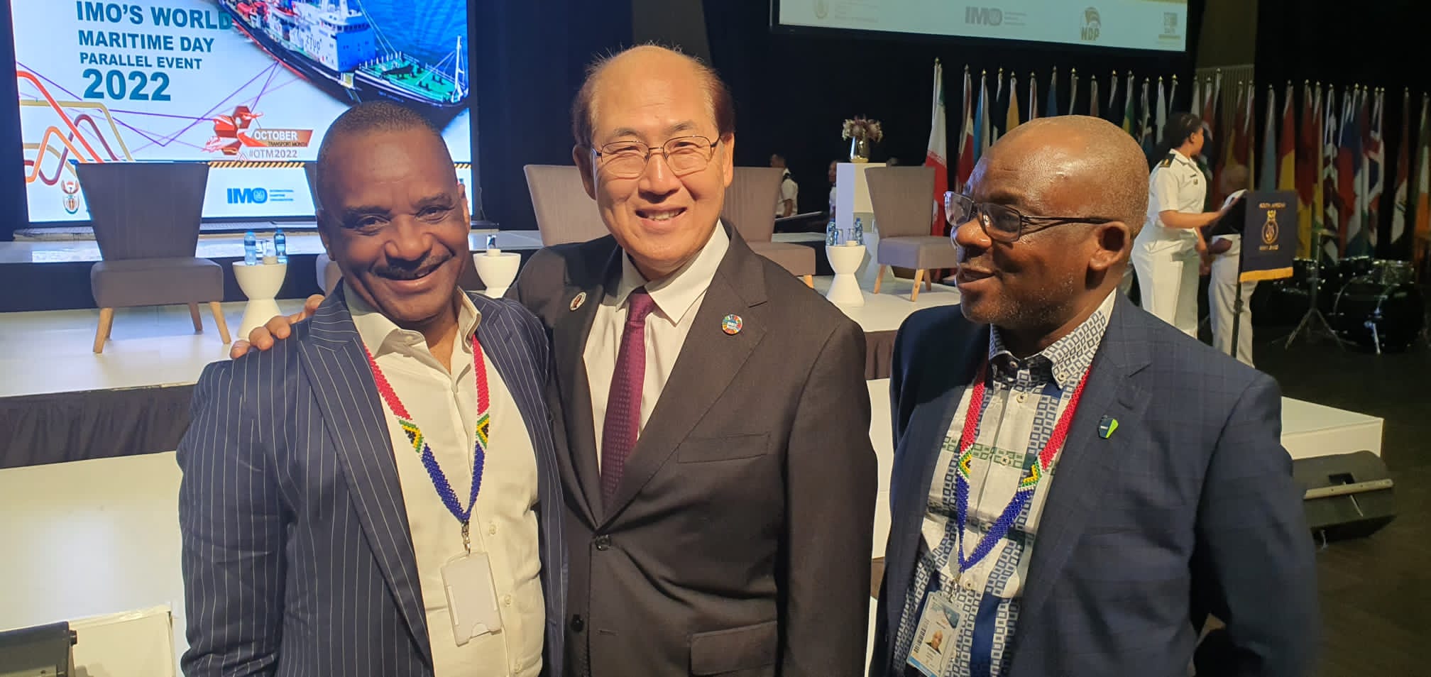 IMO Secretary-General Mr Kitack Lim (middle) embraces the NIMASA DG, Dr. Bashir Jamoh, OFR, as Nigeria's Alternate Permanent Representative (APR) to the IMO, Abdul Dirisu looks on during World Maritime Day Parallel Event held in Durban, South Africa.