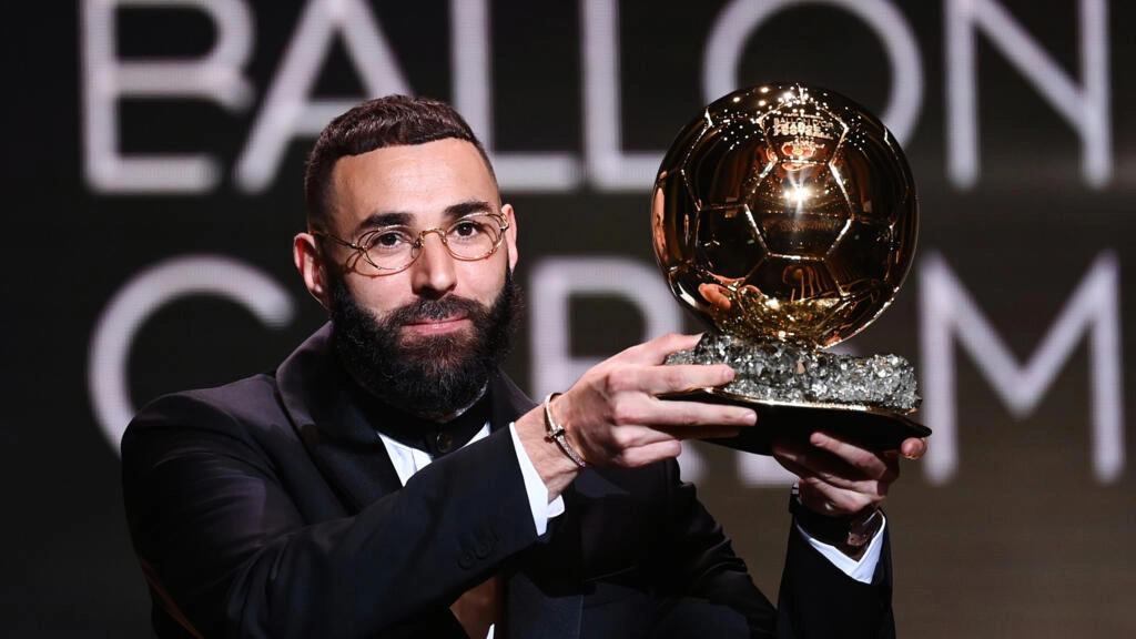 Karim Benzema receives the Ballon d'Or at a ceremony in Paris on Monday FRANCK FIFE AFP