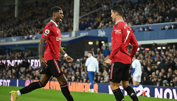 Manchester United’s Portuguese striker Cristiano Ronaldo (R) celebrates scoring his team’s second goal with Manchester United’s English striker Marcus Rashford (L) during the English Premier League football match between Everton and Manchester United at Goodison Park in Liverpool, north west England on October 9, 2022. (Photo by Oli SCARFF / AFP)