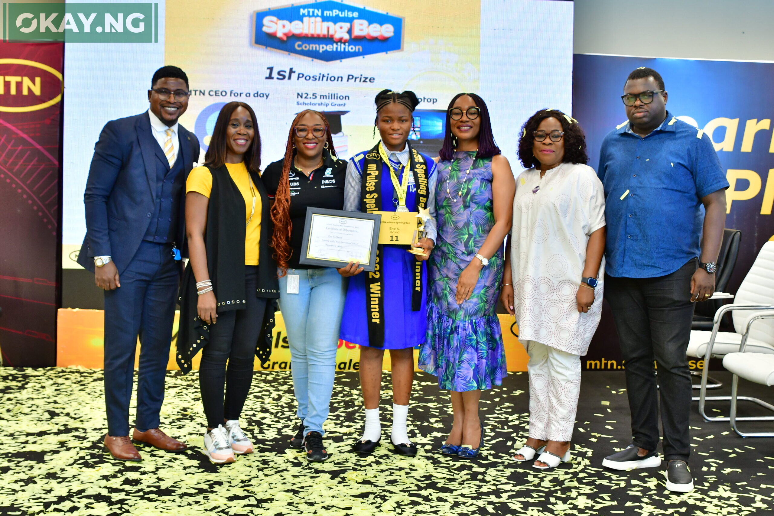 L-R: Titus Schwa Bankole, Bee Master; Odunayo Sanya, Executive Secretary, MTN Foundation; Ifeoluwa Oyeyipo, Acting Senior Manager Youth Segment, MTN Nigeria; Kate Ene David, Winner, 2022 MTN mPulse Spelling Bee; Ugonwa Nwoye, Chief Customer Service Officer, MTN Nigeria; Esther Akinnukawe, Chief Human Resources Officer, MTN Nigeria and Idowu Adesokan, Acting General Manager, Consumer Marketing, MTN Nigeria, at the 2022 MTN mPulse Spelling Bee Grand Finale, which held at the MTN Nigeria Rooftop, Ikoyi Lagos on November 26, 2022.