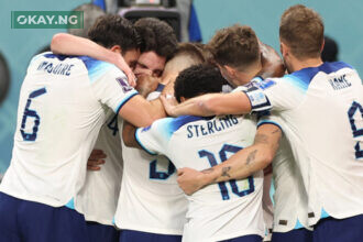 England’s forward #17 Bukayo Saka (C) celebrates with teammates after he scored during the Qatar 2022 World Cup Group B football match between England and Iran at the Khalifa International Stadium in Doha on November 21, 2022. (Photo by Fadel Senna / AFP)