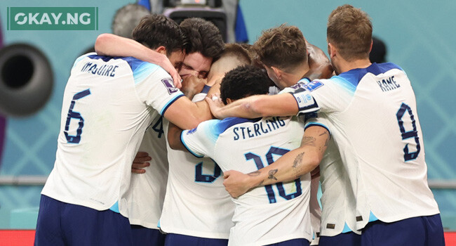 England’s forward #17 Bukayo Saka (C) celebrates with teammates after he scored during the Qatar 2022 World Cup Group B football match between England and Iran at the Khalifa International Stadium in Doha on November 21, 2022. (Photo by Fadel Senna / AFP)