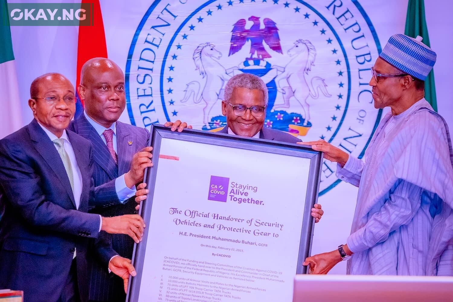 (L-R) Leaders of CACOVID, Governor of Central Bank (CBN), Godwin Emefiele; Group Managing Director of Access Holding, Herbert Wigwe; and the Chairman of Aliko Dangote Foundation, (ADF), Alhaji Aliko Dangote making a symbolic presentation of the 130 security vehicles to President Muhammadu Buhari by CACOVID.