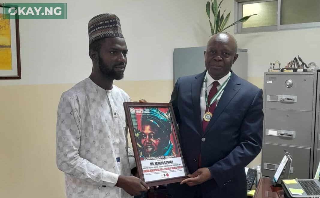 L-R: : Yakubu Gontor, Director, Financial Services, Nigerian Communications Commission (NCC) being presented with Shield of Niger Northern Youth Award by Bilal Mohammed, Vice President, Northern Youth Council of Nigeria, in Abuja recently.