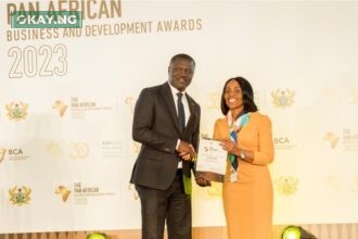 Mrs. Kanayo Awani, Executive Vice President of Afrexim Bank, presenting the *Financial Institution of the Year* award won by First Bank of Nigeria Limited to Victor Yaw Asante, MD of FBNBank Ghana representing CEO, FirstBank Group at the Afreximbank Pan African Business and Development Awards 2023 in Accra Ghana.