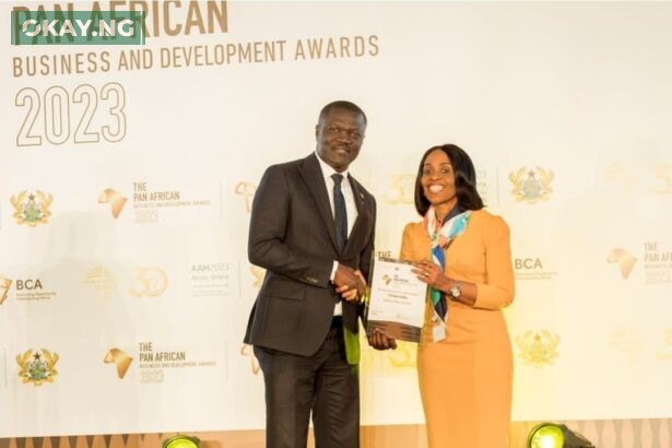Mrs. Kanayo Awani, Executive Vice President of Afrexim Bank, presenting the *Financial Institution of the Year* award won by First Bank of Nigeria Limited to Victor Yaw Asante, MD of FBNBank Ghana representing CEO, FirstBank Group at the Afreximbank Pan African Business and Development Awards 2023 in Accra Ghana.