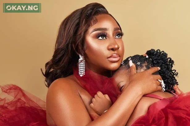 Ini Edo and daughter