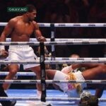 British boxer Anthony Joshua (L) competes with Cameroonian-French boxer Francis Ngannou during their heavyweight boxing match in Riyadh's Kingdom Arena indoor stadium, on March 9, 2024. (Photo by Fayez Nureldine / AFP)