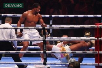 British boxer Anthony Joshua (L) competes with Cameroonian-French boxer Francis Ngannou during their heavyweight boxing match in Riyadh's Kingdom Arena indoor stadium, on March 9, 2024. (Photo by Fayez Nureldine / AFP)