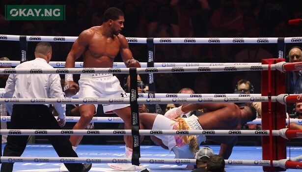 British boxer Anthony Joshua (L) competes with Cameroonian-French boxer Francis Ngannou during their heavyweight boxing match in Riyadh's Kingdom Arena indoor stadium, on March 9, 2024. (Photo by Fayez Nureldine / AFP)