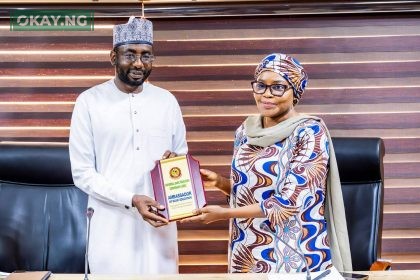 DG NITDA, Kashifu Inuwa CCIE (left), receiving an award for an Ambassador of Basic Education from the ES UBEC, Hajia Aisha Garba (right)