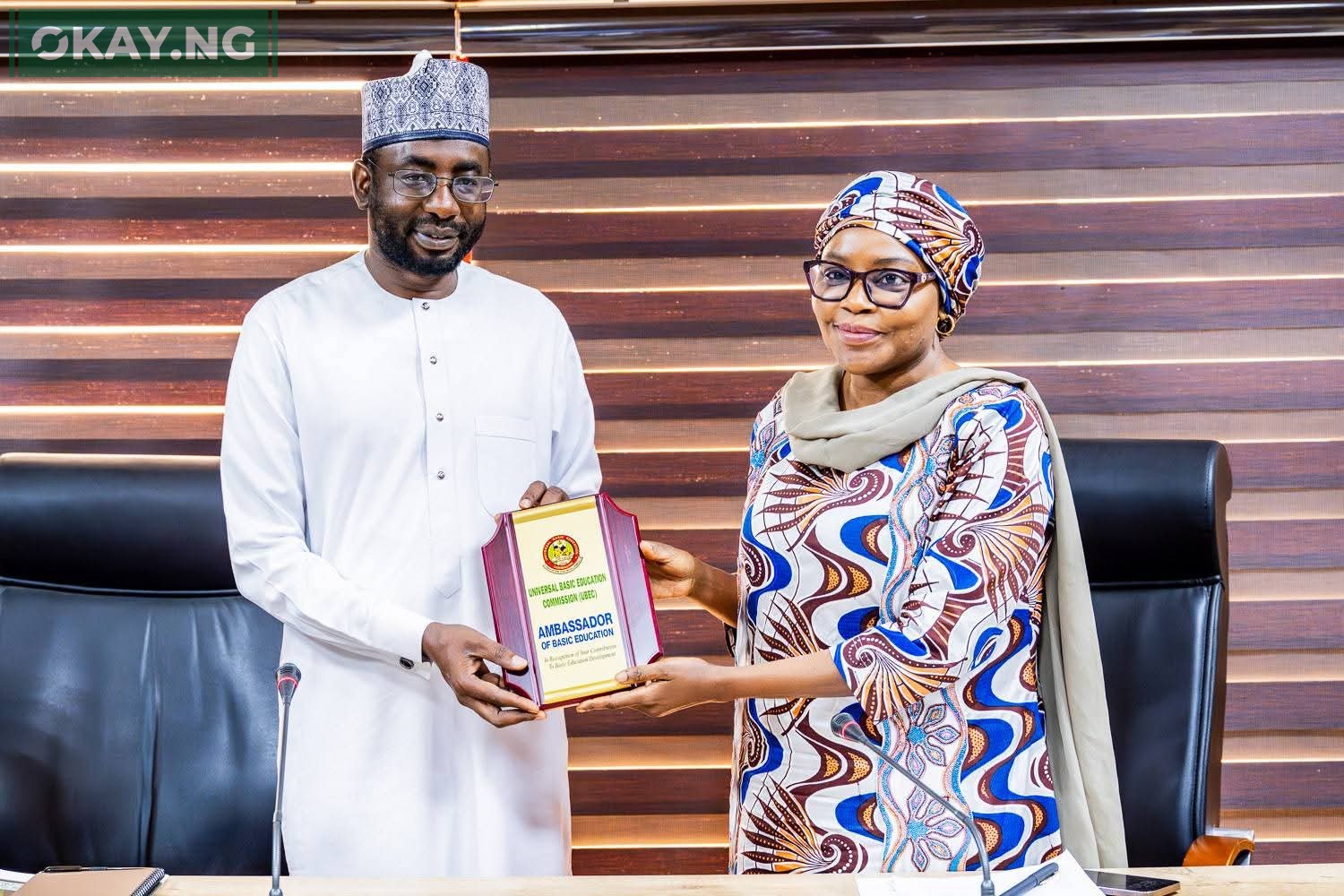 DG NITDA, Kashifu Inuwa CCIE (left), receiving an award for an Ambassador of Basic Education from the ES UBEC, Hajia Aisha Garba (right)