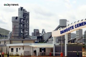Dangote Cement factory in Nigeria, showing industrial production facilities and storage silos.