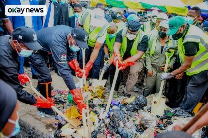 Lagos Governor Babajide Sanwo-Olu and Deputy Governor Obafemi Hamzat join officials in a symbolic street cleaning exercise to mark the return of Lagos State's monthly environmental sanitation exercise, which resumes fully on April 25 after a nine-year suspension.