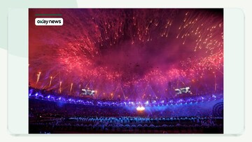 Fireworks explode as the Olympic Cauldron is seen alight during the opening ceremony of the London 2012 Olympic Games at the Olympic Stadium July 27, 2012. REUTERS/Suzanne Plunkett